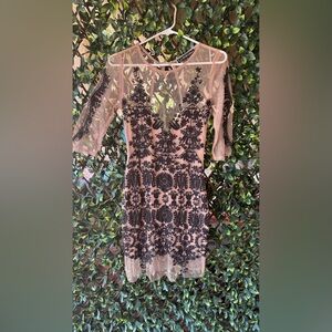 Elegant Black and Nude Lace Dress